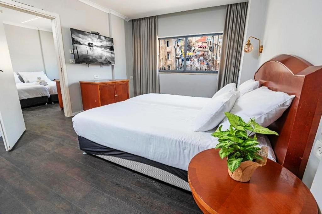 Rooms at the Spirit of Herzl Boutique Hotel