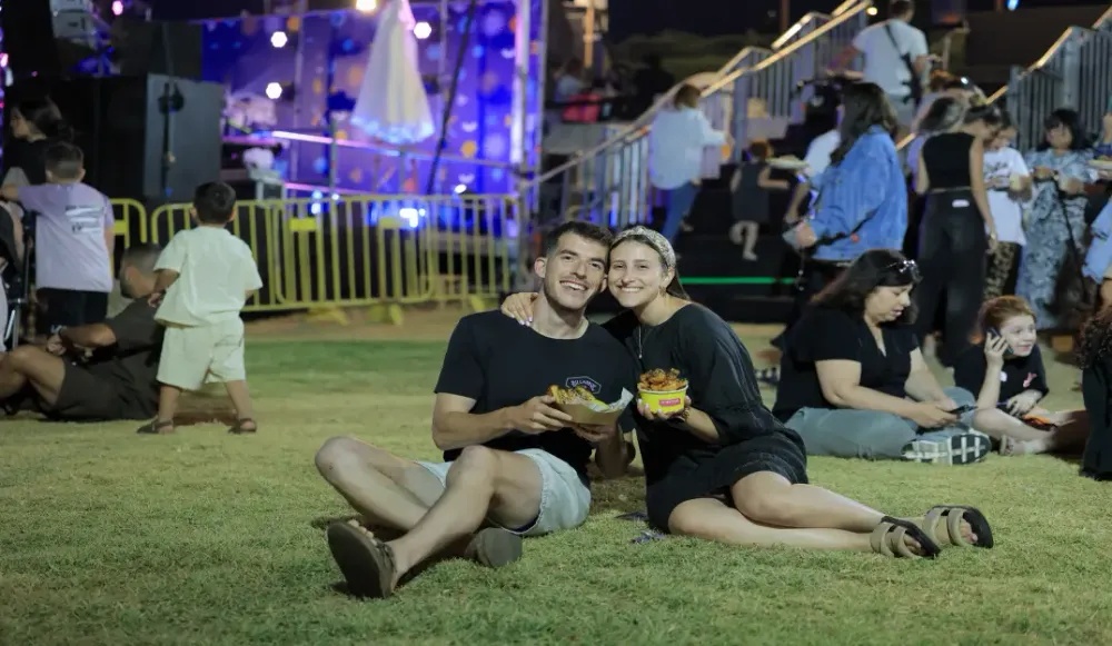 Jerusalem Couple Enjoying a Night Out at the Food Truck Festival